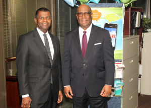 John Scroggins, (right) Unity Bank President and staff