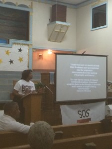 Dorris Ellis, hosting the first town hall for the Freedmen's Town Preservation Coalition about the preservation of the brick streets.