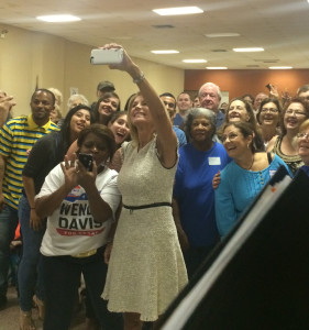 Wendy Davis taking an "usie" with the volunteers after her speech.