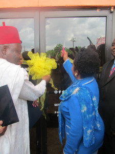 Congresswoman Sheila Jackson Lee and Dr. Iguh cutting the ribbon.