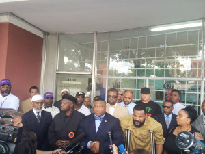 Quanell X speaking to the media about the armed robbery at Mr. Indian Beauty Supply