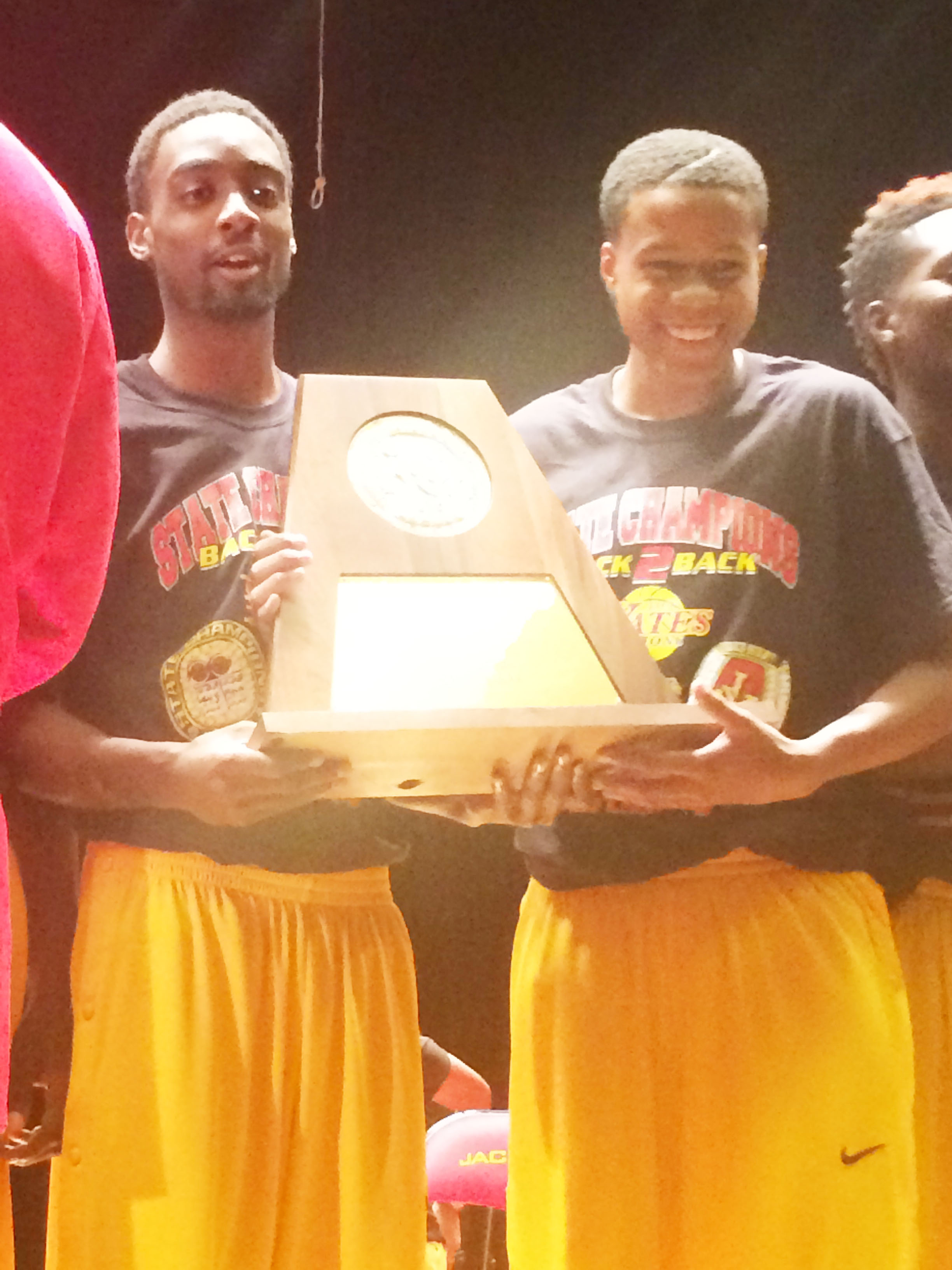 Yates Championship players holding their trophy