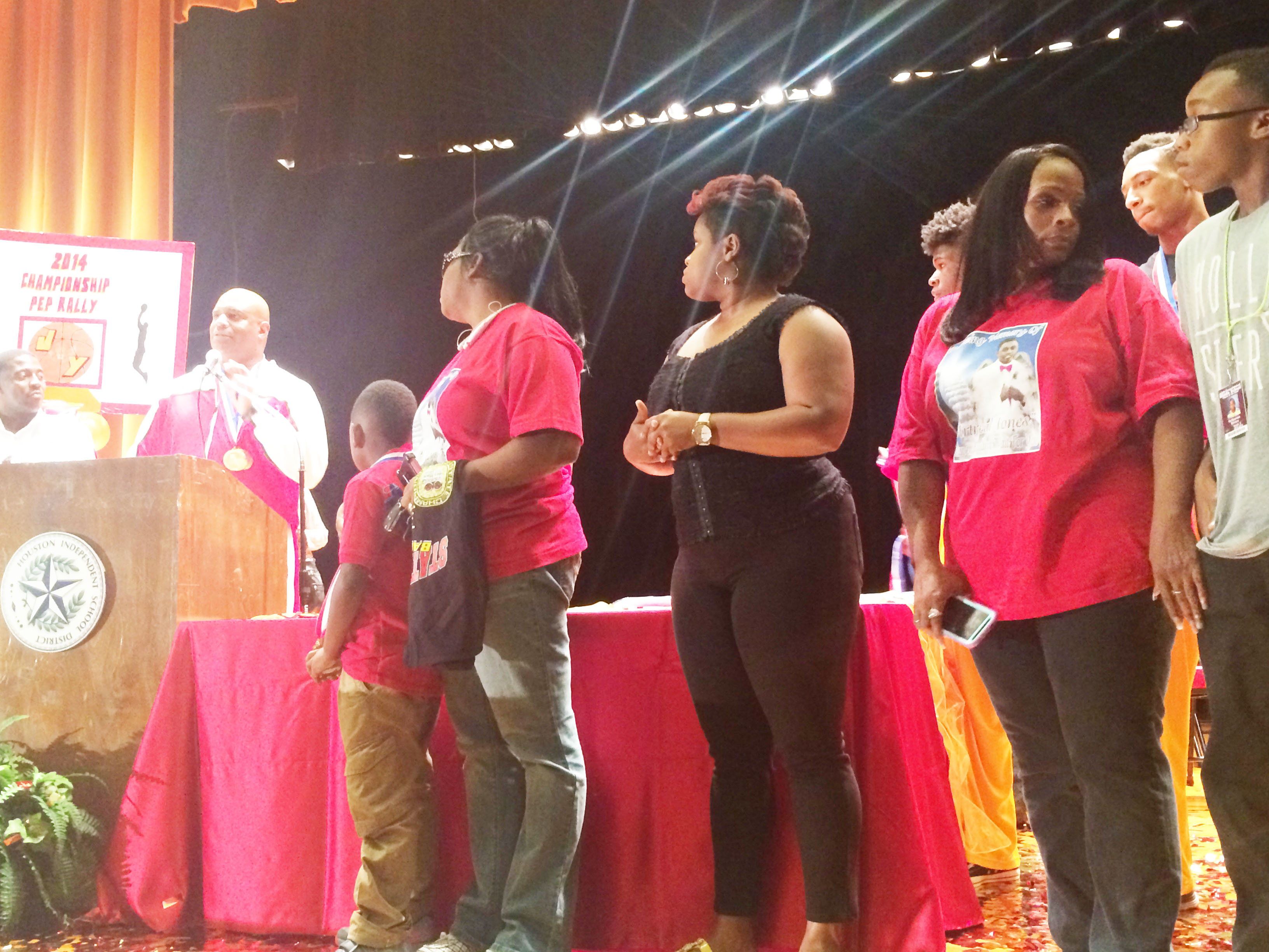 Artreal Jones family, a fallen Yates Basketball player who was on the championship team, accepts his awards