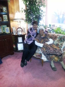 The 109-year-old Mrs. Emma Primas is joined by her granddaughter, Denise Mickey at their home.