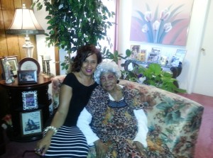 The Houston Sun's Sheila Ray-Reed shares a special moment with Mrs. Emma Primas.