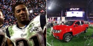 Patriots' defensive end, Malcolm Butler and the 2015  Chevy Super Bowl truck that MVP Tom Brady intends to hand over to him.  