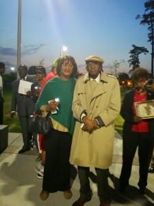 Dorris Ellis, publisher -editor of the Houston Sun talks with Ovide Duncantell, founder and president of the Black Heritage Society during candlelight vigil at the MLK statue that he fought to secure.