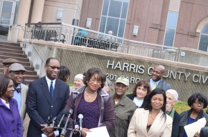 Dorris Ellis, president of the Freedmen's Town Preservation Coalition speaks at a press conference announcing that the Coalition has prevailed in its temporary restraining hearing on the steps of the Civil Court House in Houston, TX. The Coalition goes to trial on May 4 in its effort to preserve the historic bricks in Freedmen's Town. Standing left of  Ellis is pro bono attorney Benjamin Hall.