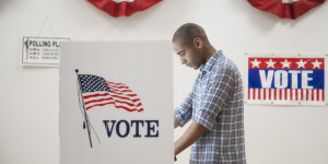 Man voting in polling place